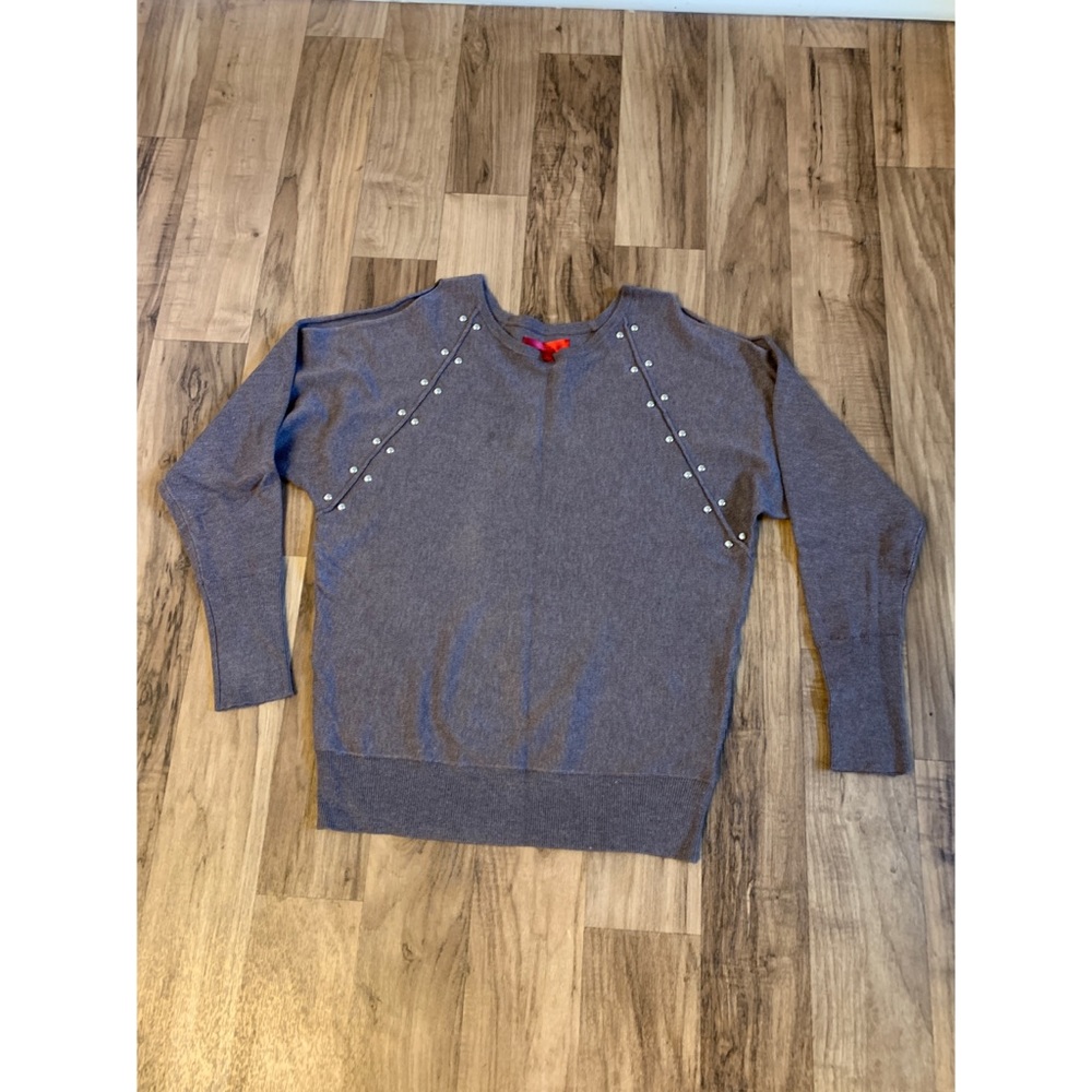 Cold shoulder studded sweater